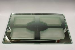 A French Art Deco mirror glass tray, possible Jean Luce, 33 x 54cm.