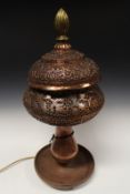 A damasque pierced copper lantern/table lamp.