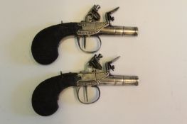 A pair of French flintlock boxlock pocket pistols, 1 inch turn-off three stage canon barrels, border