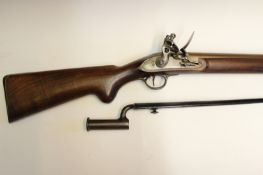 A fine and rare Ezekiel Baker & Son flintlock trials musket, 39 inch sighted browned barrel engraved