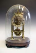 A late 19th Century brass skeleton clock, with fusee movement, open silvered dial with Roman