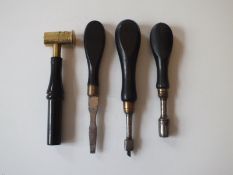 Four various gun tools, turn screw, nipple wrench, combination powder and shot measure plus one