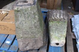 A pair of staddle stones and tops.