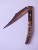 A tortoise shell and ivory mounted Spanish folding knife, 17cm clipped back blade stamped TOLEDO,