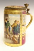 A 19th Century Vienna style gilt metal mounted lidded tankard, painted with scenes of courtly and