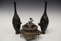 A pair of Japanese Meiji bronze vases, decorated with hen and cockerel in high relief, each with