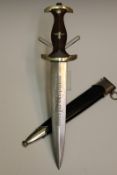 A Third Reich NSKK dagger, 22cm flattened diamond section blade etched with the motto Alles fur