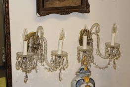 A pair of early 20th Century glass two branch wall lights. (2)