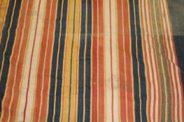 A tribal flatweave rug.
