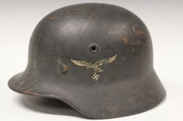 A Third Reich M40 Pattern Luftwaffe helmet, the grey painted skull with single Luftwaffe Eagle