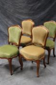 Four 19th Century French carved salon chairs in Louis XV style, with moulded show frames. (4)