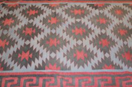 A tribal flatweave Kelim rug, 209 x 119cm.