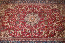 A large Persian room size carpet, of classic design.