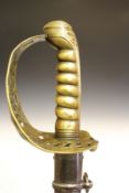 A brass hilted Heavy Cavalry sword, 80cm slightly curved blade with pipe back and spear point,
