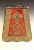 A 7th (Queen’s Own) Hussars Officer’s sabretache, gold bullion cypher on a red felt ground, gold