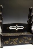 A fine lacquered Japanese sword stand, for five swords, the body decorated over all with gold