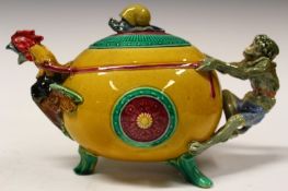 A 19th Century Minton majolica teapot and cover, shape 624, decorated in polychrome on a mustard