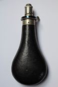 A rare Gibbs rifle flask, leather covered body with white metal top with graduated nozzle.