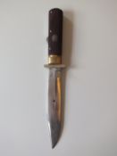 A folding Bowie knife, 16.5cm blade with clipped back point, white metal swivel crossguard,