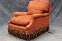 A mid 20th Century Lenygan & Morant Howard deep seat armchair.