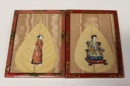 A pair of Chinese export leaf watercolours of figures in traditional costume, in red lacquer