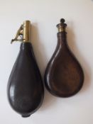 A Bartram leather shot flask, graduated for 1 1/4 to 1 1/2oz, together with another with another