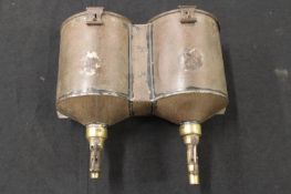 A rare set of Dixon wall mounted shot and powder dispensers, the tin bodies retaining traces of