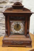 An eight day Junghans bracket clock, chiming on five rods, 46cm high.