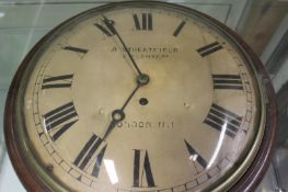 A mid 19th century mahogany cased fusee wall clock, with 12 inch convex circular dial, and cast