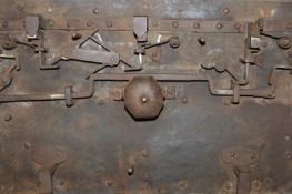An Armada Chest, the iron bound and riveted body with two side handles and locking lid, the interior