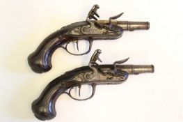 A pair of French flintlock Queen Anne style rifled travelling pistols by Durdiniere, 2 inch three-