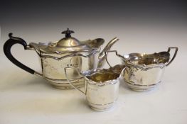 A silver three piece tea set, by Alexander Clark, Birmingham 1906 and 1911, comprising tea pot, milk