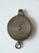 A steel Sykes cap dispenser, 1 3/4 inch diameter, ring suspender, stamped SYKES to the top.