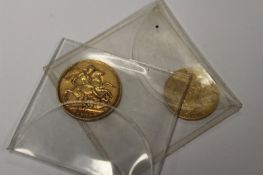 A Victoria gold sovereign 1901, and a half sovereign. (2)