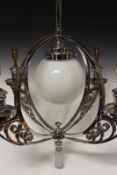 An Art Deco chrome ceiling light with central globe and four branch lights.