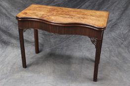 A good 18th Century Chippendale style serpentine foldover card table, with baize lined interior