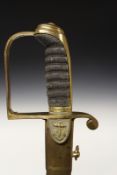 An 1805 Pattern Naval Officer’s sword, 81cm blade etched with stands of arms, naval motifs and the