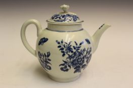An English blue and white globular teapot and cover probably Worcester, with floral and insect