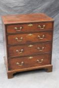 An 18th Century mahogany bachelor’s chest of small proportions, the moulded edge top above four long