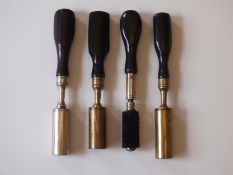 Four 12-bore chamber brushes, two by Hawksley and one by Westley Richards, three with covers. (4)