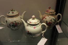 Three various 18th Century Worcester tea pots, all with floral knops, one decorated with Chinese