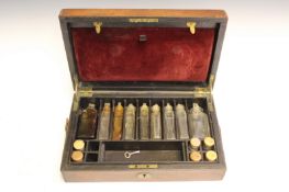 A 19th Century leather bound perfumier’s travelling box, 29cm wide, and some contents.