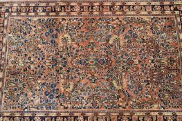 A Persian Sarouk rug, 155 x 110cm.