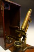 A 19th Century monocular compound microscope by Smith & Beck, London, fitted with micro adjustable