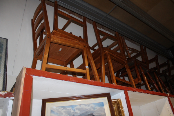 A SET OF FOUR PINE KITCHEN CHAIRS