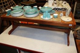 A MAHOGANY AND TILED TOP COFFEE TABLE