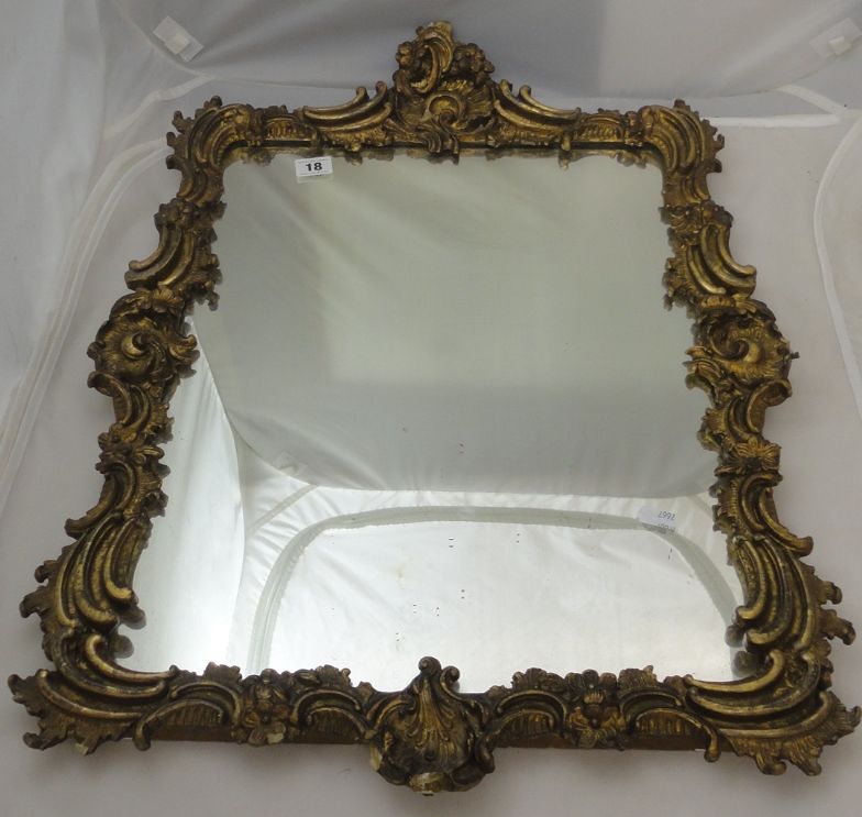 C18th/C19th Gilt Wall Mirror profusely decorated with shells, c-scrolls & flower heads, approx. 26``