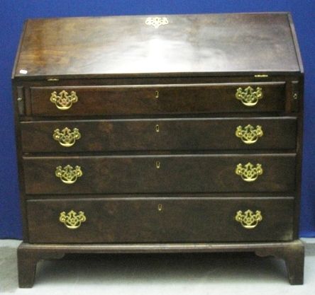 C18th Georgian Mahogany Bureau with fall enclosing pigeon holes, small drawers, centre door with 2