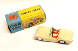 CORGI TOYS NO 301, an excellent boxed Cream with red seats Triumph TR2 Sports Car, with flat hubs,