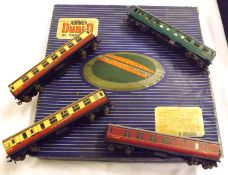 HORNBY-DUBLO COACHES ETC, four unboxed, playworn, tinplate and plastic Hornby and Tri-ang Coaches